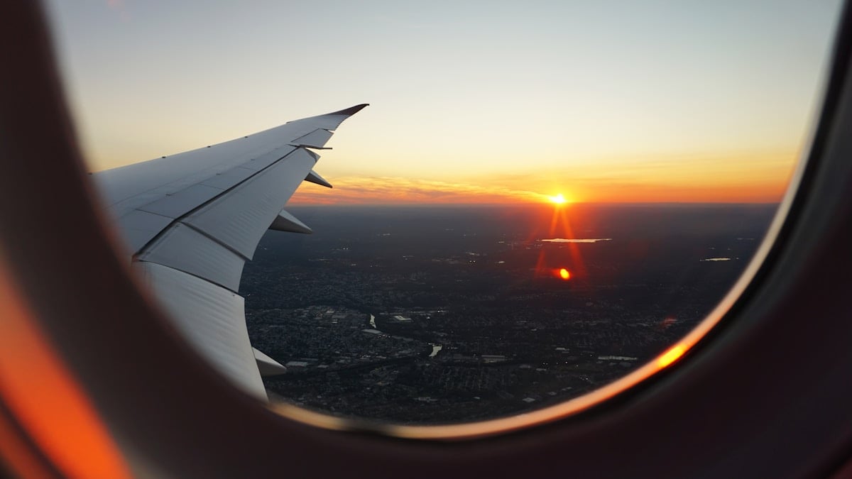 Sunset viewed through an airplane window