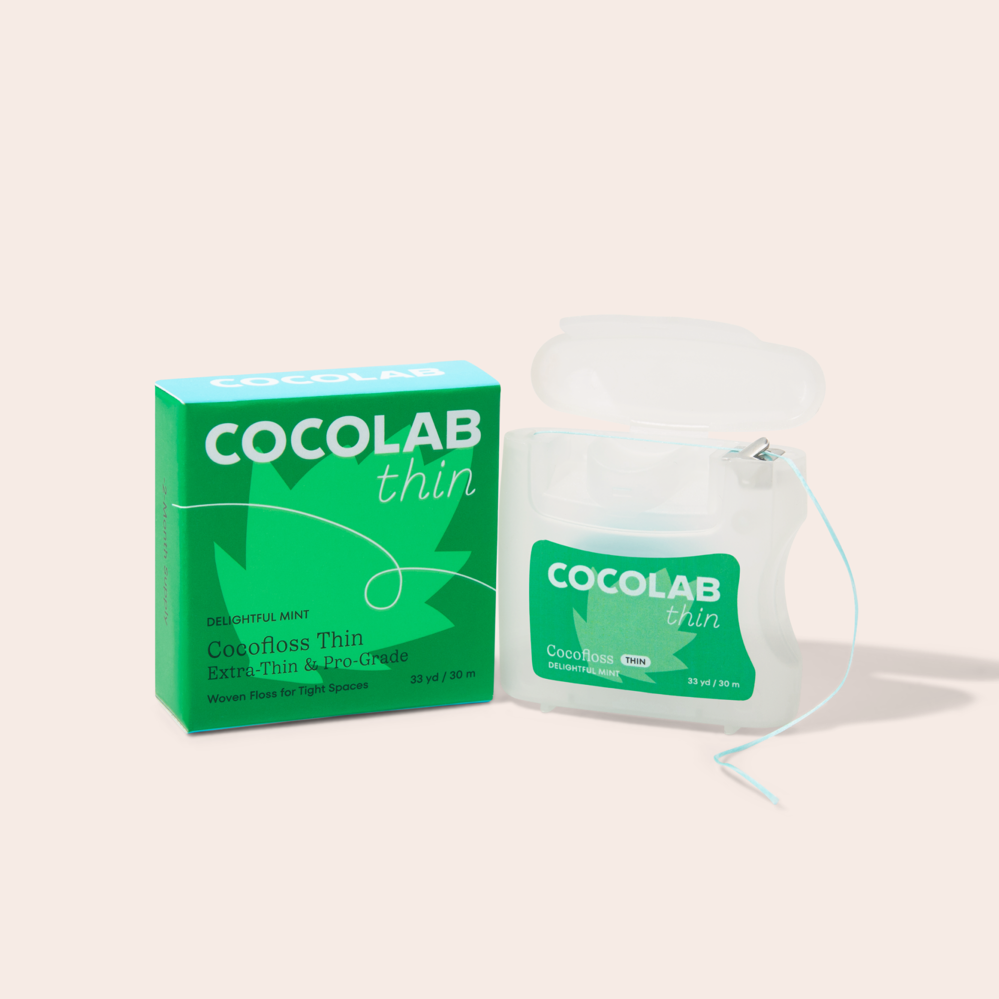 Cocofloss Thin Dental Floss in a mint container