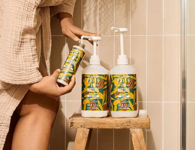 Faith In Nature 2.5 litre curly haircare refill bottles in a natural bathroom setting