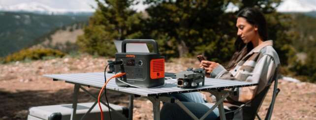 Jackery Explorer 240 v2 power station used at an outdoor table