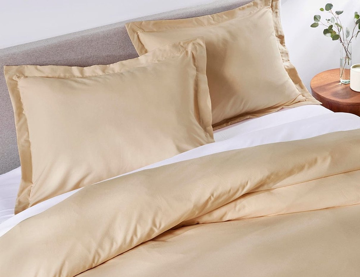 Almond Ivory duvet cover styled on a bed
