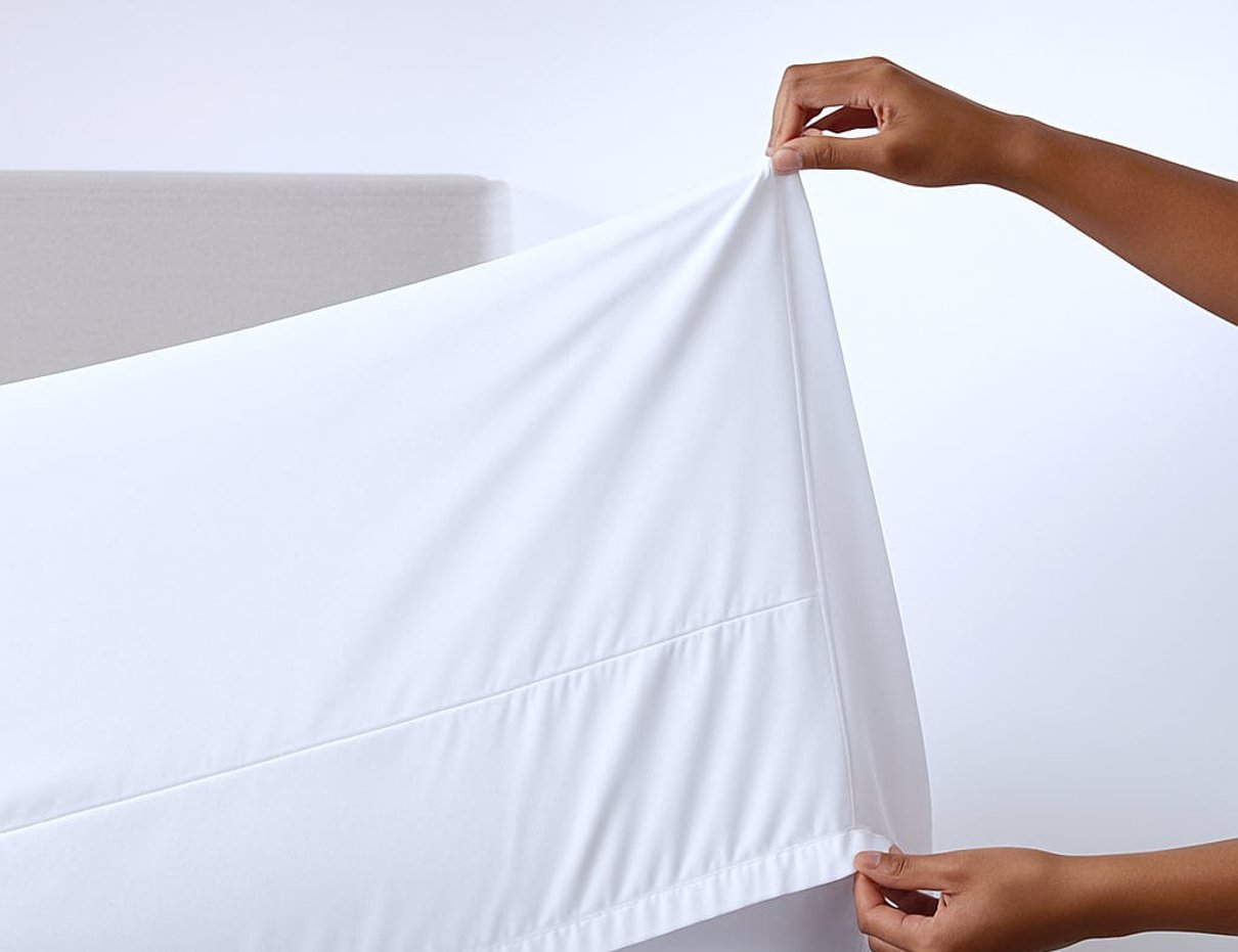White sheet fitted on a mattress
