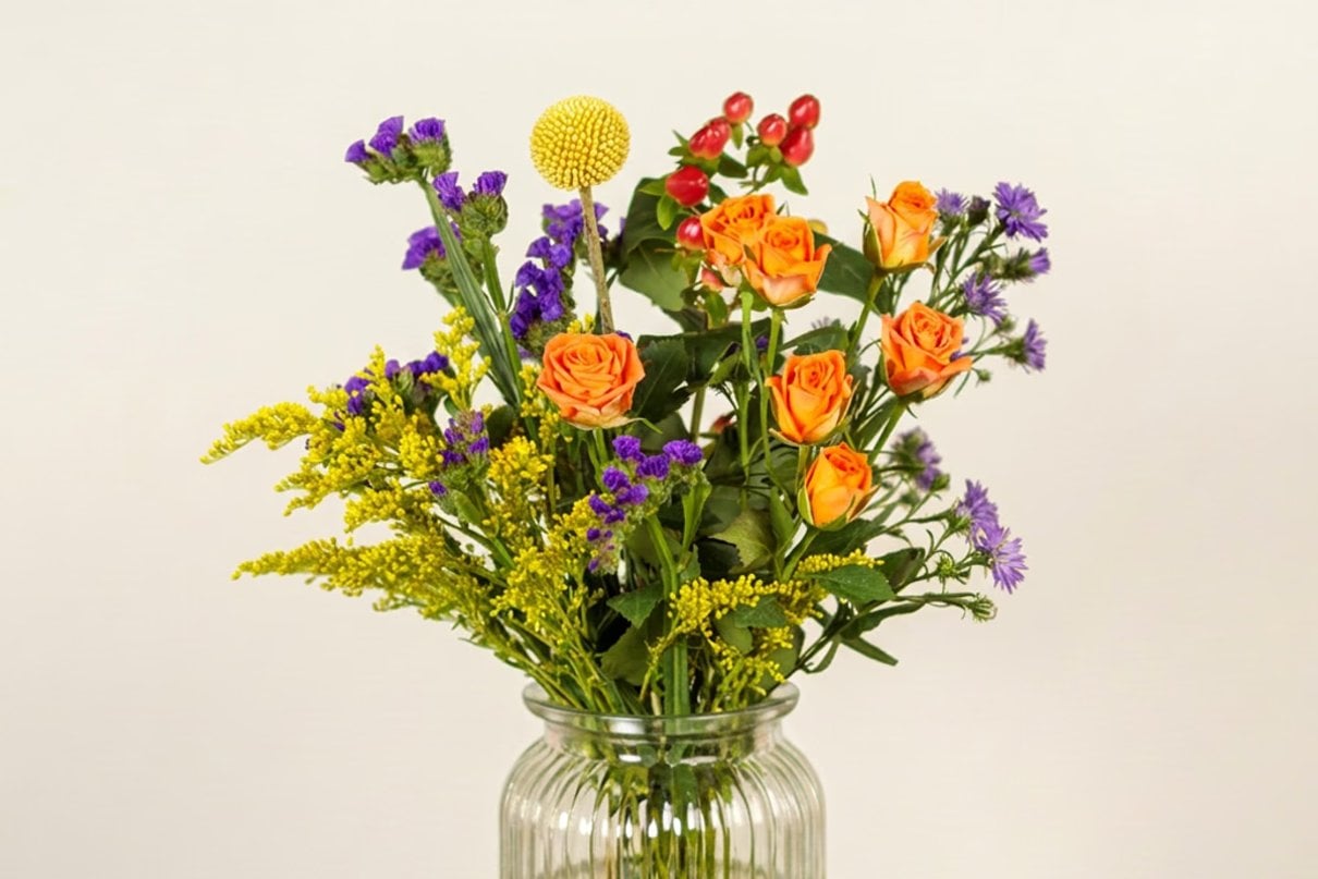 Bright Posy bouquet with orange roses and colourful seasonal flowers