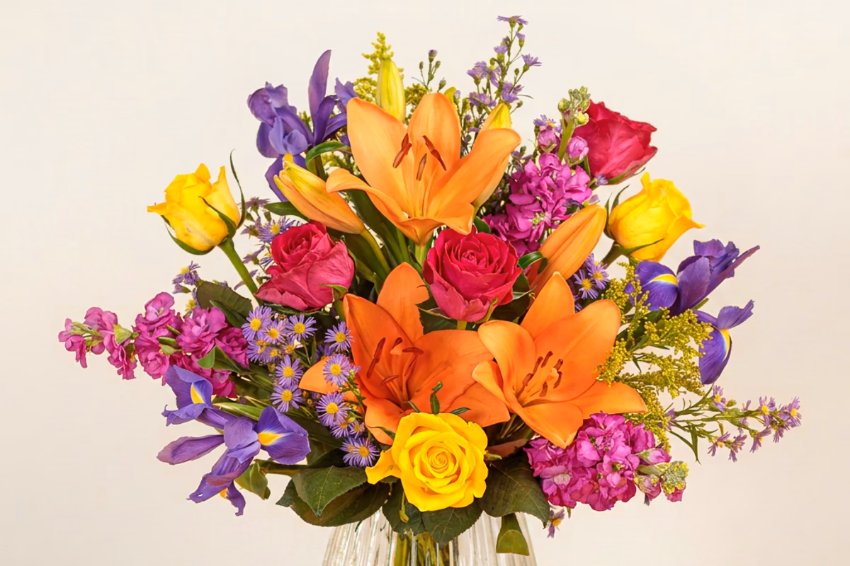Floral Ratatouille bouquet with colourful roses, lilies and irises