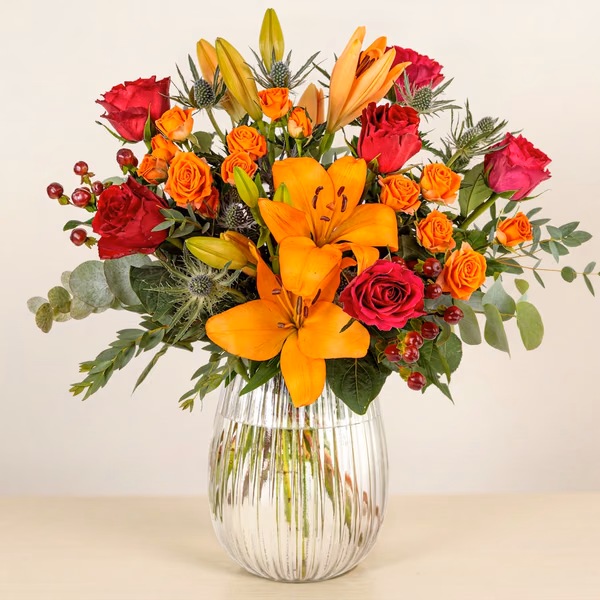 Wild Harvest bouquet with orange lilies and red roses